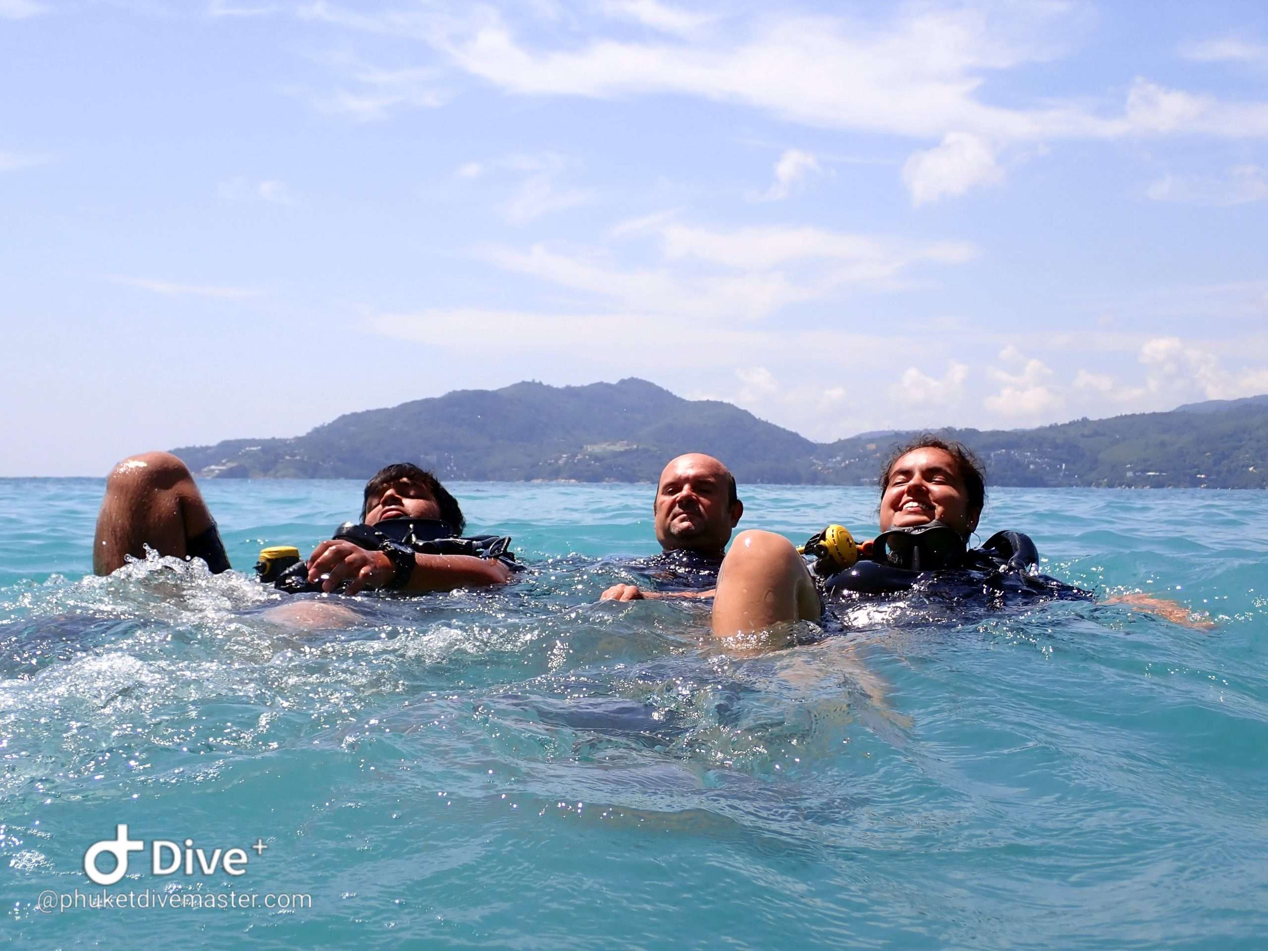 Divers practicing surface rescue at Kata Beach